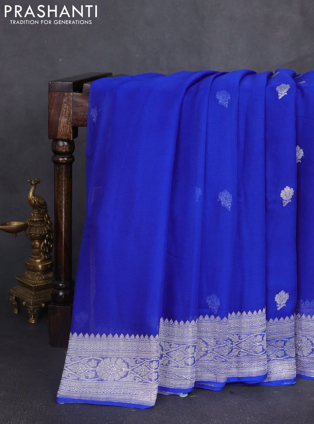 Banarasi chiffon saree royal blue with silver zari woven buttas and floral silver zari woven border