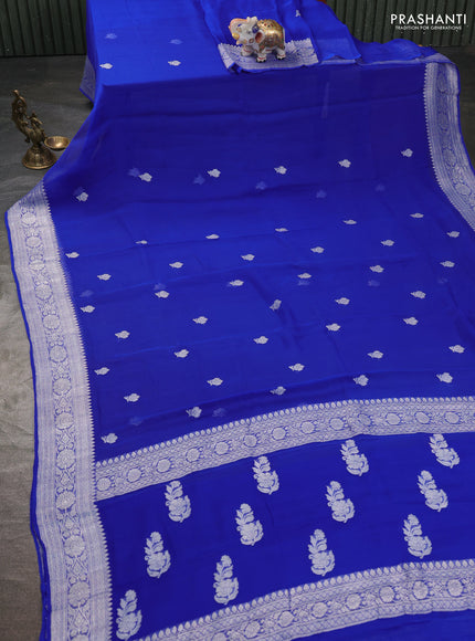 Banarasi chiffon saree royal blue with silver zari woven buttas and floral silver zari woven border