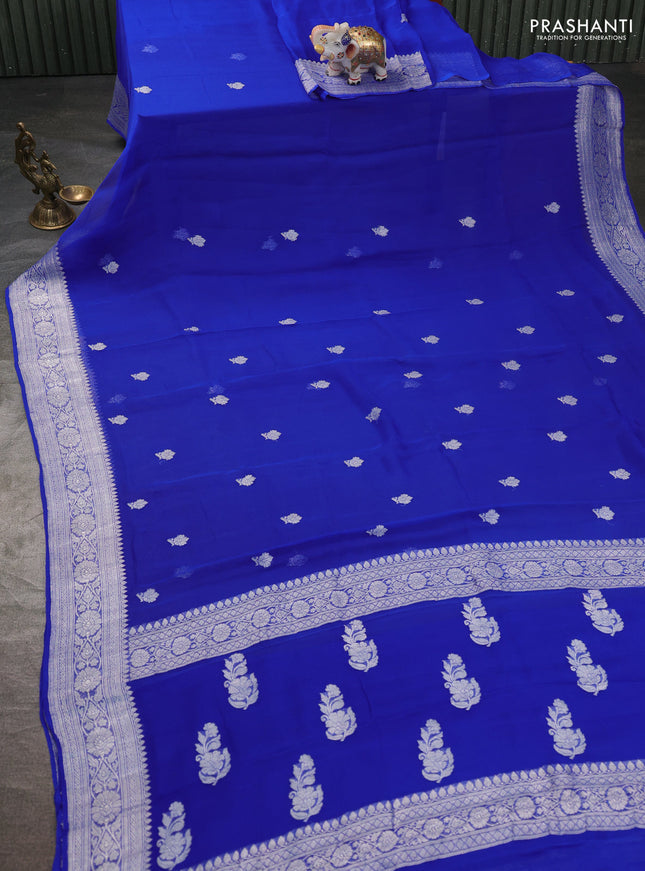 Banarasi chiffon saree royal blue with silver zari woven buttas and floral silver zari woven border