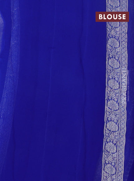 Banarasi chiffon saree royal blue with silver zari woven buttas and floral silver zari woven border