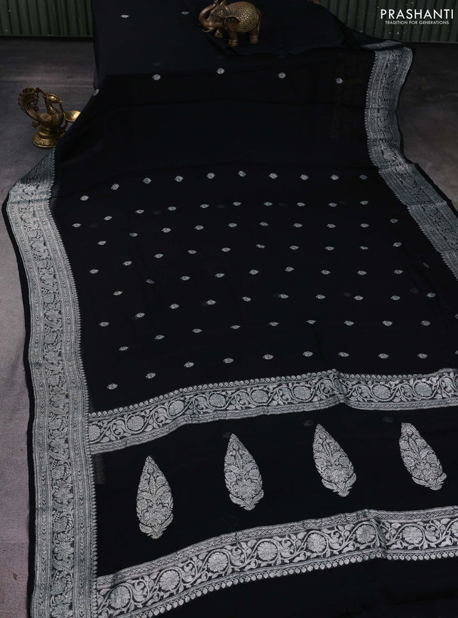Banarasi chiffon saree black with silver zari woven buttas and floral silver zari woven border