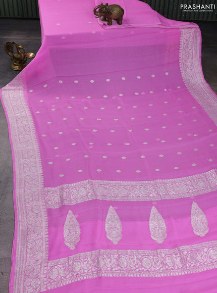 Banarasi chiffon saree light pink with silver zari woven buttas and floral silver zari woven border