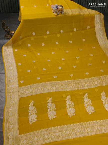 Banarasi chiffon saree yellow with silver zari woven buttas and floral silver zari woven border
