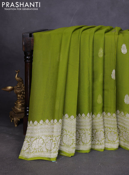 Banarasi chiffon saree mehendi green with silver zari woven buttas and floral silver zari woven border