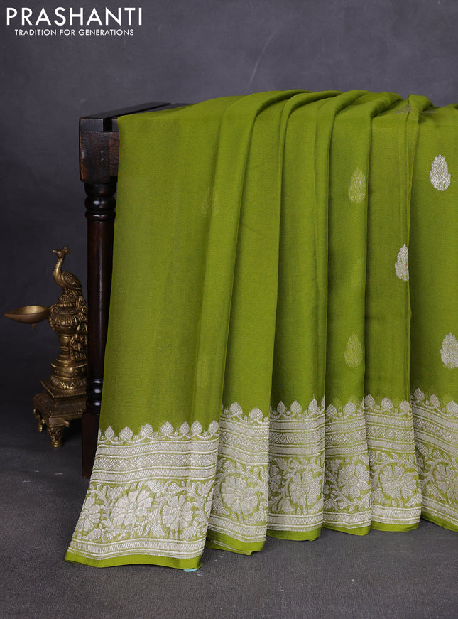 Banarasi chiffon saree mehendi green with silver zari woven buttas and floral silver zari woven border