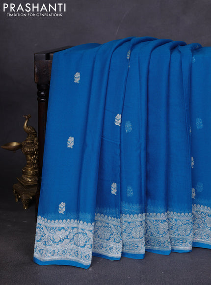 Banarasi chiffon saree cs blue with silver zari woven buttas and floral silver zari woven border