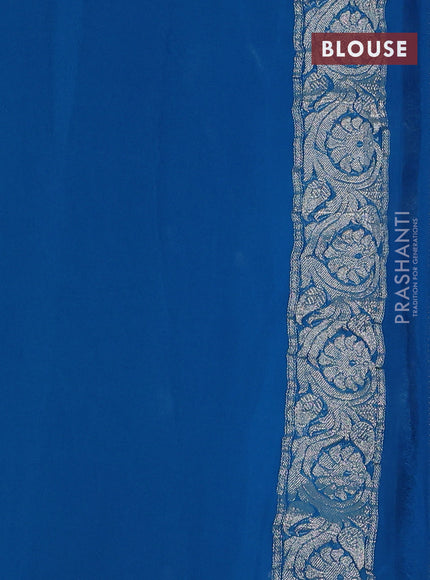 Banarasi chiffon saree cs blue with silver zari woven buttas and floral silver zari woven border