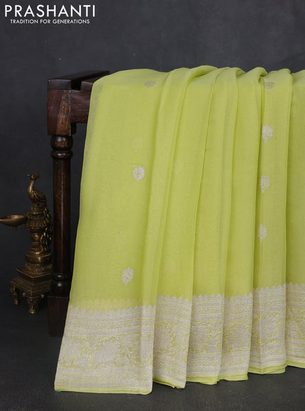 Banarasi chiffon saree lime yellow with silver zari woven buttas and floral silver zari woven border