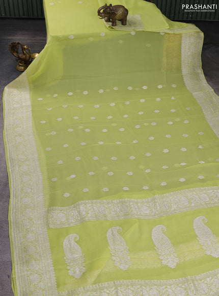 Banarasi chiffon saree lime yellow with silver zari woven buttas and floral silver zari woven border