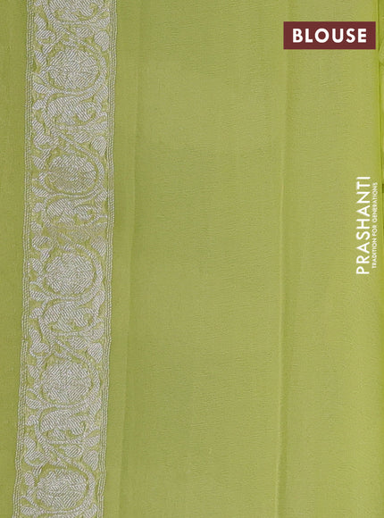 Banarasi chiffon saree lime yellow with silver zari woven buttas and floral silver zari woven border