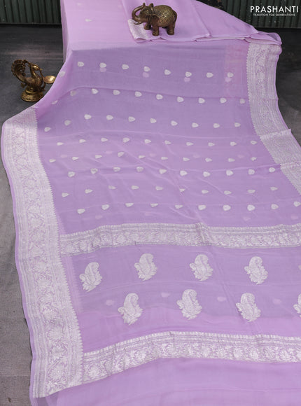 Banarasi chiffon saree pastel lavender with silver zari woven buttas and floral silver zari woven border