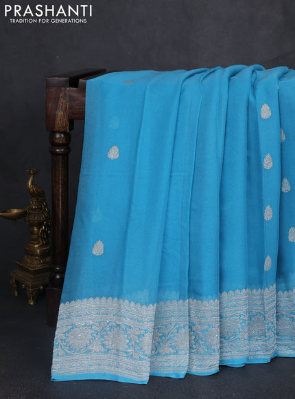 Banarasi chiffon saree light blue with silver zari woven buttas and floral silver zari woven border