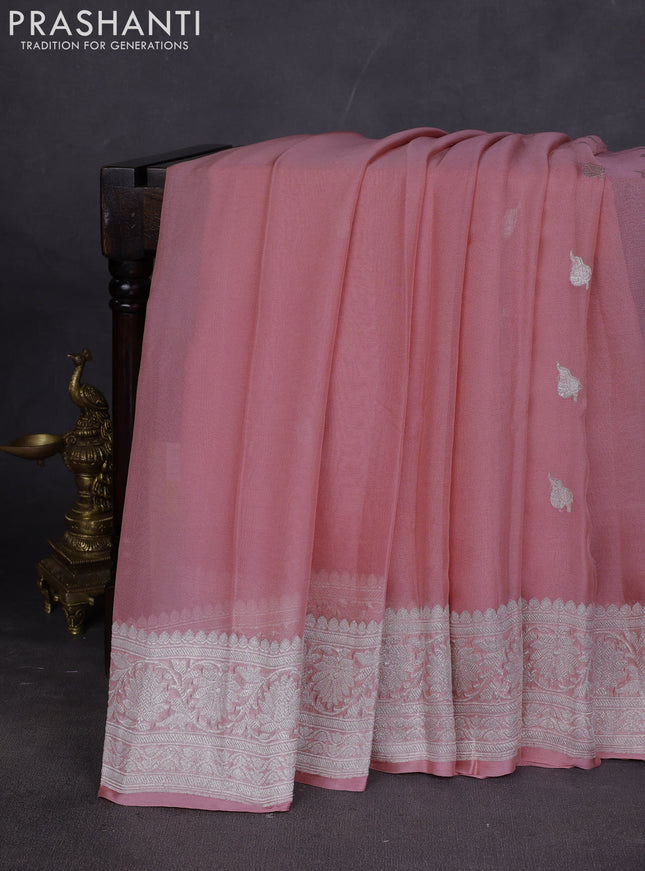 Banarasi chiffon saree pastel peach with silver zari woven buttas and floral silver zari woven border
