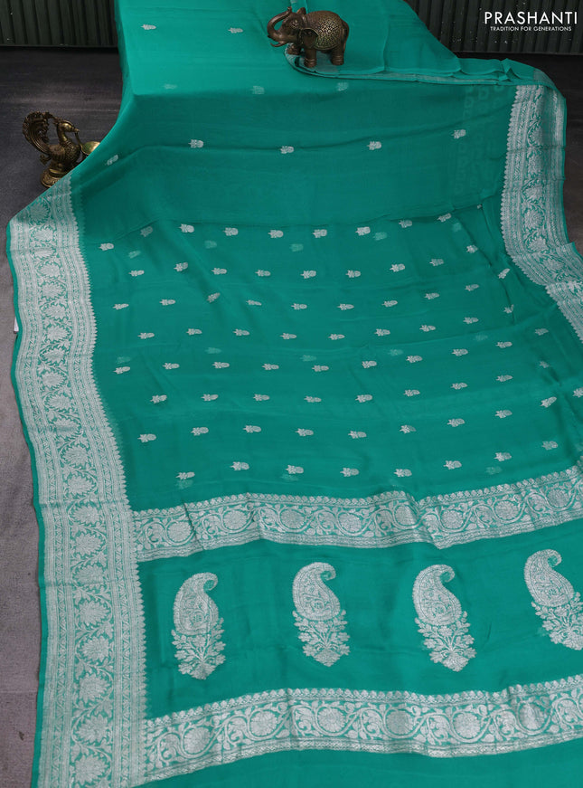 Banarasi chiffon saree teal green with silver zari woven buttas and floral silver zari woven border