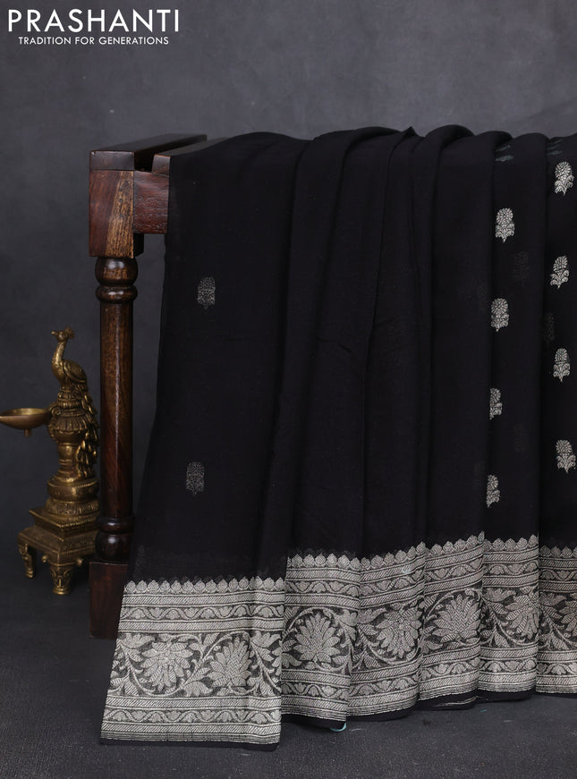 Banarasi chiffon saree black with silver zari woven buttas and floral silver zari woven border