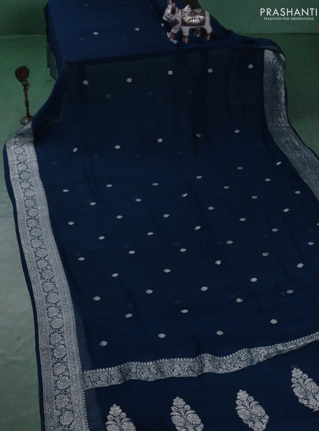 Banarasi chiffon saree peacock blue with silver zari woven buttas and floral silver zari woven border