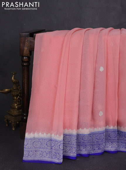 Banarasi chiffon saree peach shade and blue with silver zari woven buttas and floral silver zari woven border