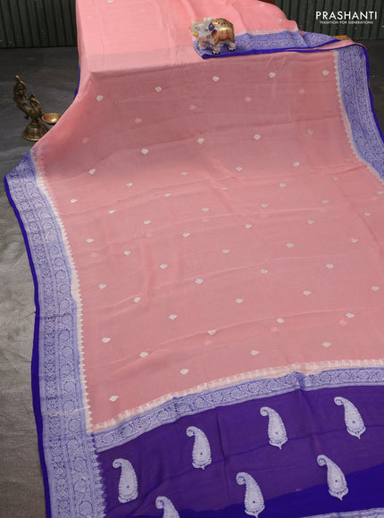 Banarasi chiffon saree peach shade and blue with silver zari woven buttas and floral silver zari woven border