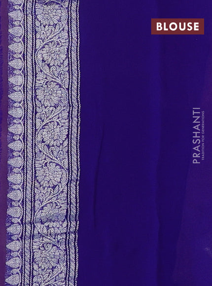 Banarasi chiffon saree peach shade and blue with silver zari woven buttas and floral silver zari woven border