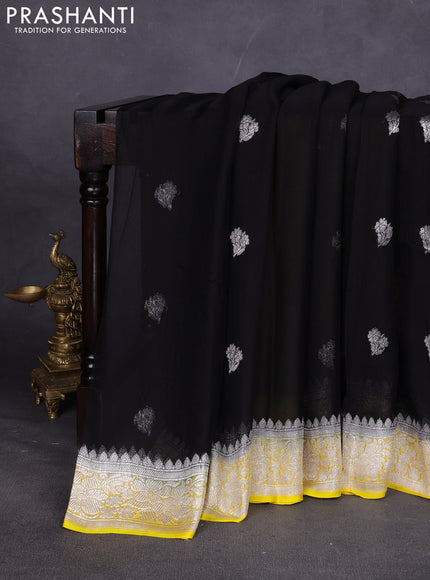 Banarasi chiffon saree black and yellow with silver zari woven buttas and floral silver zari woven border
