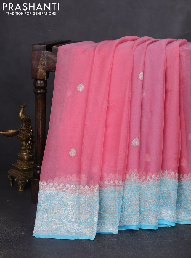 Banarasi chiffon saree mild peach pink and light blue with silver zari woven buttas and floral silver zari woven border