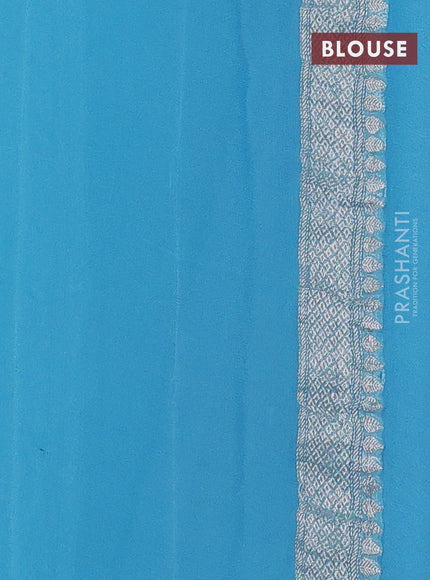 Banarasi chiffon saree mild peach pink and light blue with silver zari woven buttas and floral silver zari woven border