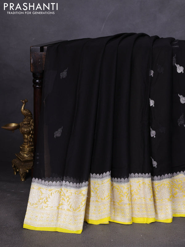 Banarasi chiffon saree black and yellow with silver zari woven buttas and floral silver zari woven border