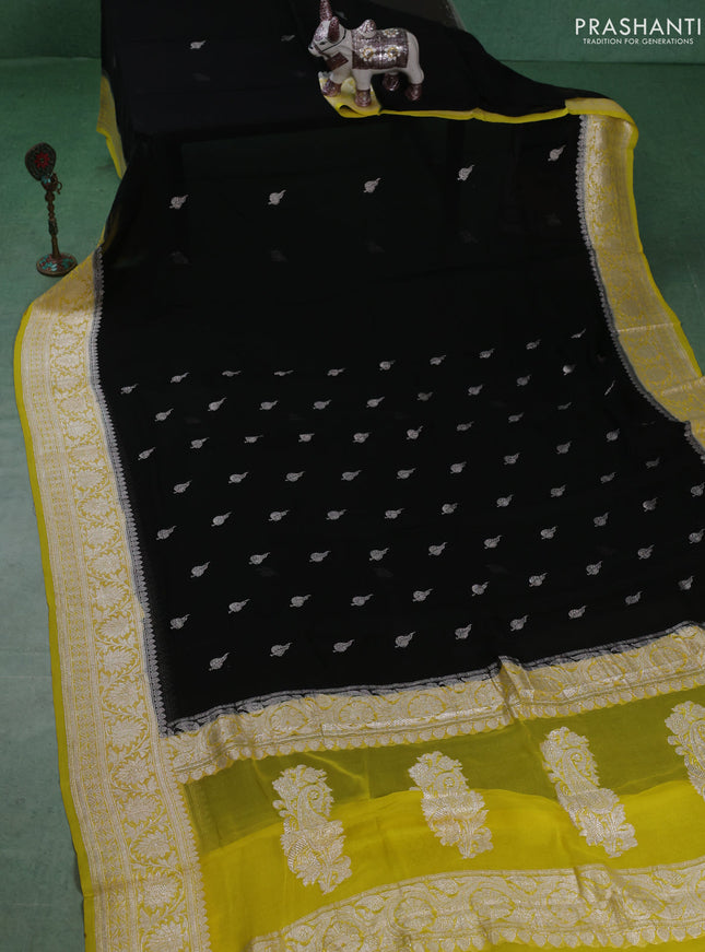 Banarasi chiffon saree black and yellow with silver zari woven buttas and floral silver zari woven border