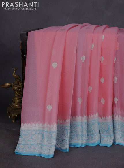 Banarasi chiffon saree mild peach pink and light blue with silver zari woven buttas and floral silver zari woven border