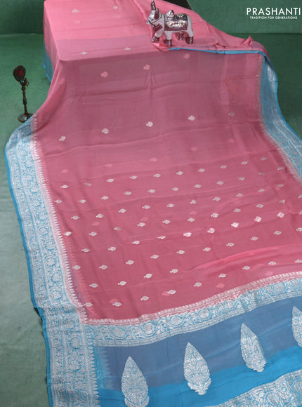 Banarasi chiffon saree mild peach pink and light blue with silver zari woven buttas and floral silver zari woven border