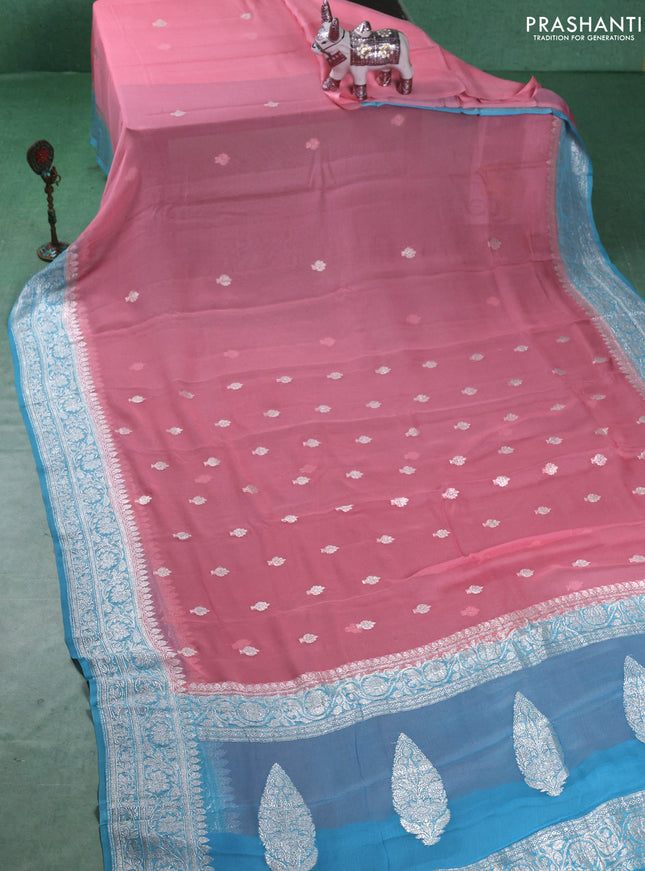 Banarasi chiffon saree mild peach pink and light blue with silver zari woven buttas and floral silver zari woven border