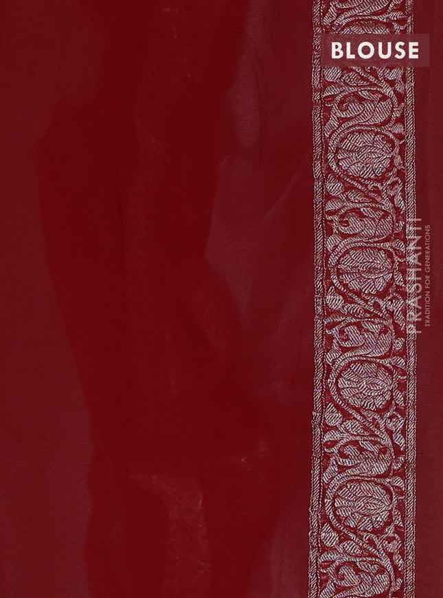 Banarasi chiffon saree light blue and kumkum red with silver zari woven buttas and floral silver zari woven border