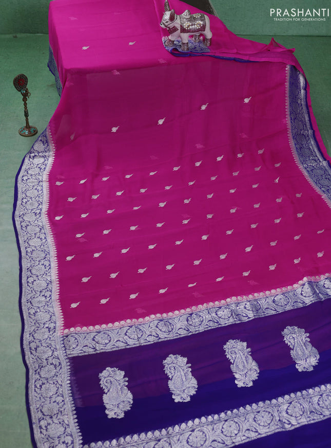 Banarasi chiffon saree candy pink and blue with silver zari woven buttas and floral silver zari woven border