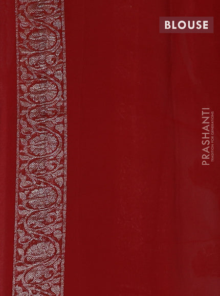 Banarasi chiffon saree mild teal blue and orange with silver zari woven buttas and floral silver zari woven border