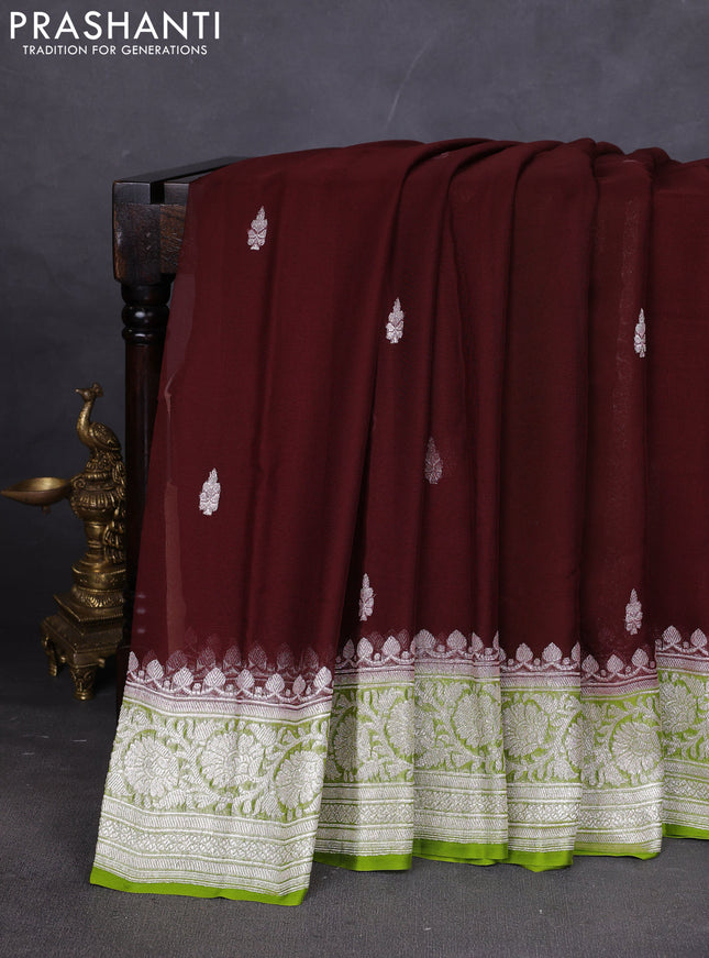 Banarasi chiffon saree deep maroon and mehendi green with silver zari woven buttas and floral silver zari woven border