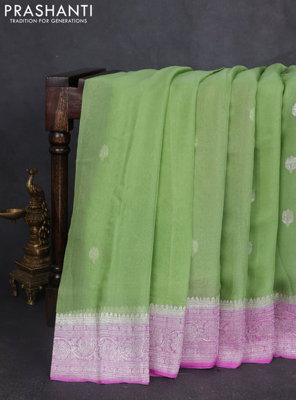 Banarasi chiffon saree pista green and lotus pink with silver zari woven buttas and floral silver zari woven border