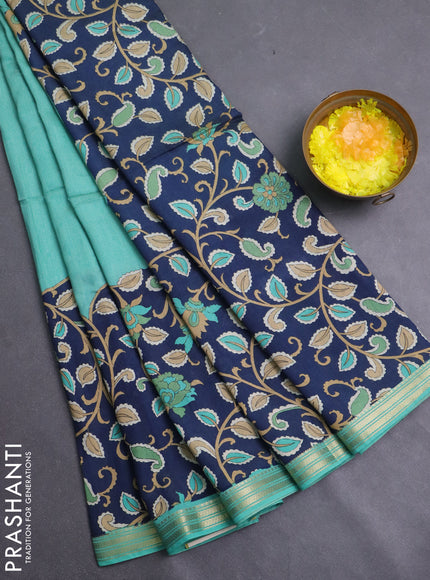 Muslin silk saree teal green shade and navy blue with allover prints and long kalamkari printed zari border