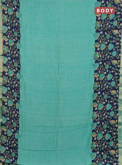 Muslin silk saree teal green shade and navy blue with allover prints and long kalamkari printed zari border