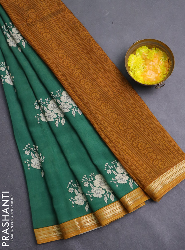 Muslin silk saree green and mustard yellow with floral butta prints and zari woven border