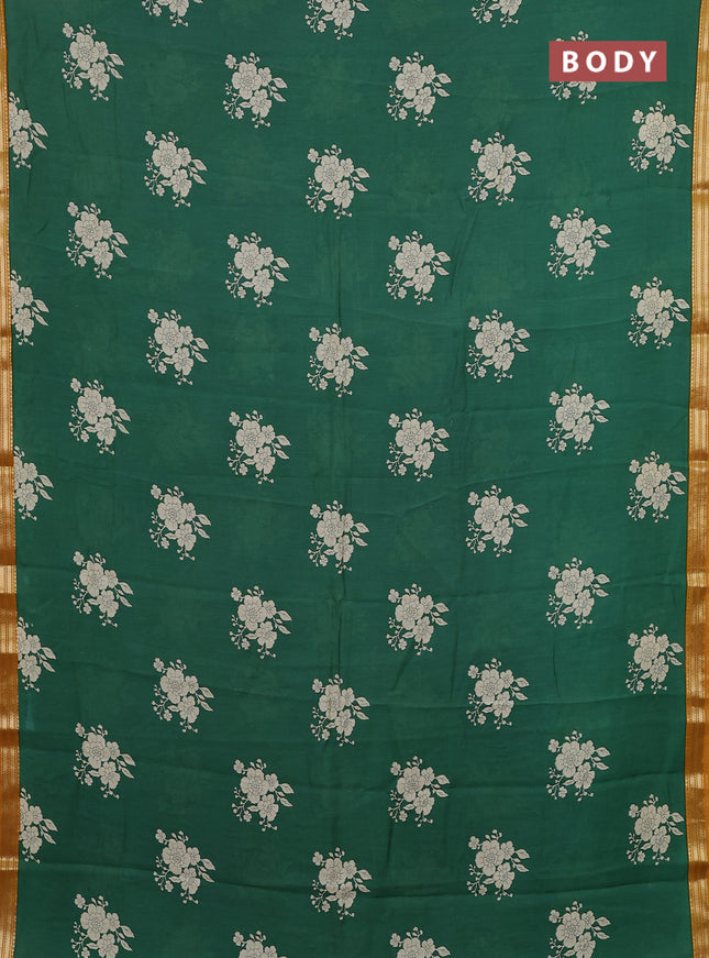 Muslin silk saree green and mustard yellow with floral butta prints and zari woven border