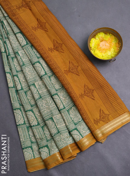 Muslin silk saree green beige and mustard yellow with allover prints and zari woven border