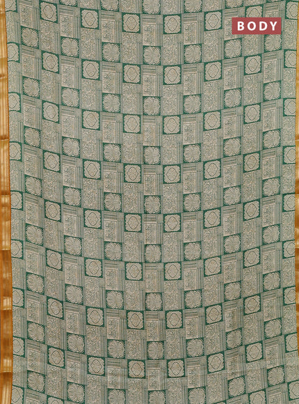 Muslin silk saree green beige and mustard yellow with allover prints and zari woven border