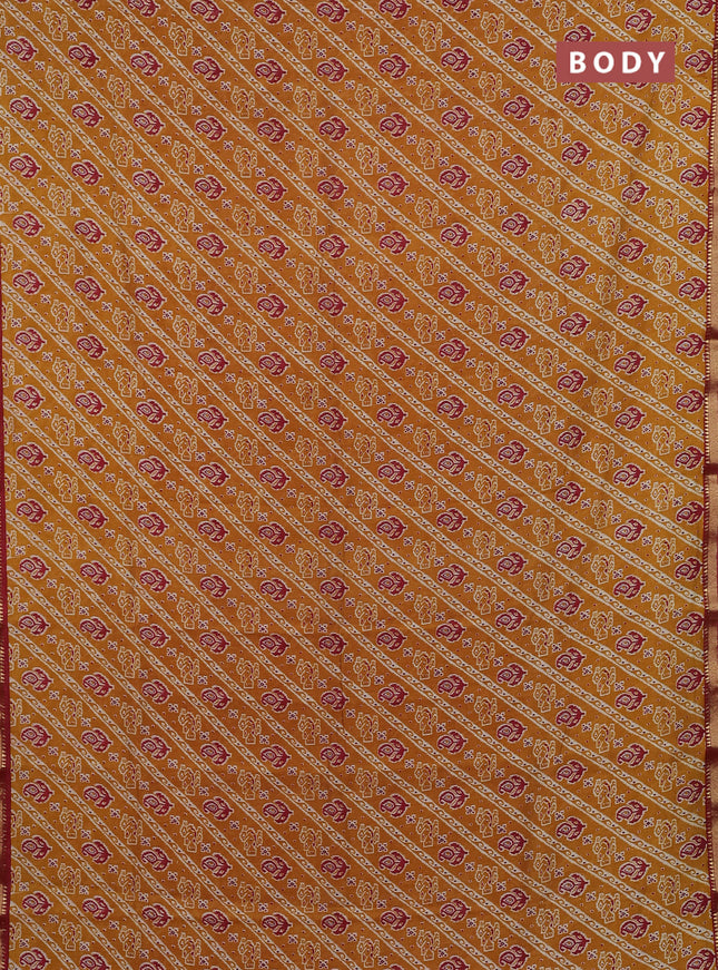 Muslin silk saree mustard yellow and maroon with allover ikat prints and zari woven border