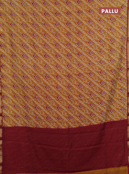 Muslin silk saree mustard yellow and maroon with allover ikat prints and zari woven border