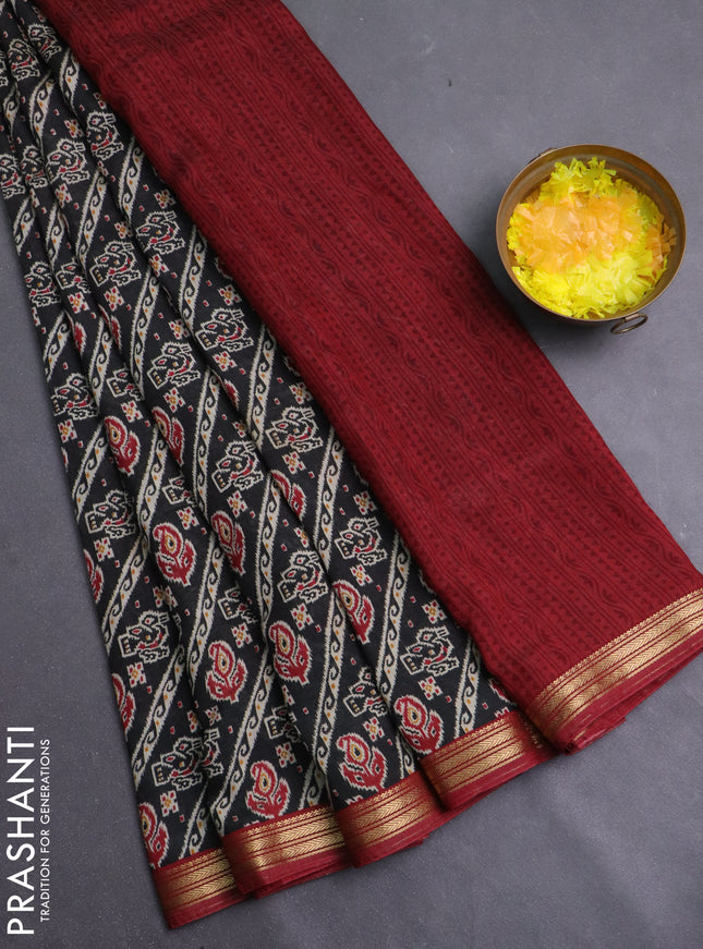 Muslin silk saree black and maroon with allover ikat prints and zari woven border