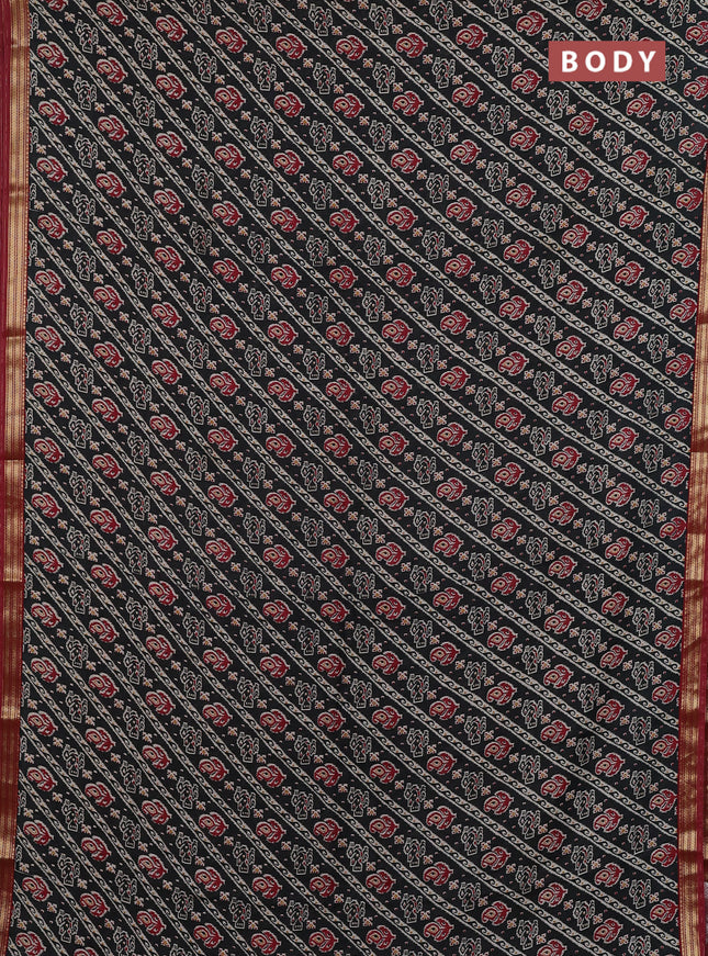 Muslin silk saree black and maroon with allover ikat prints and zari woven border