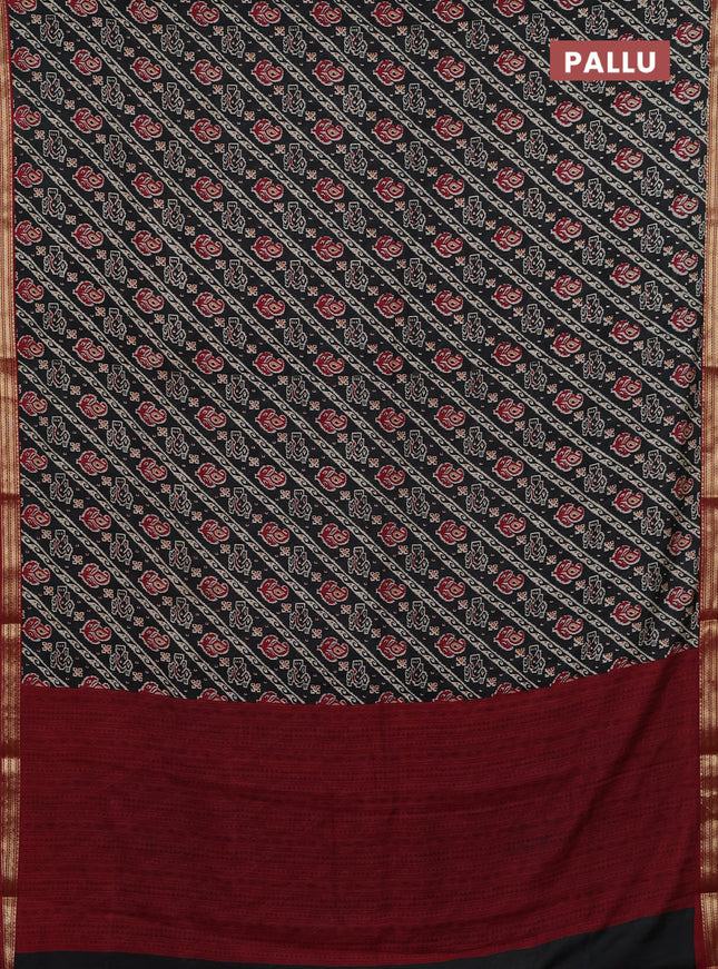 Muslin silk saree black and maroon with allover ikat prints and zari woven border