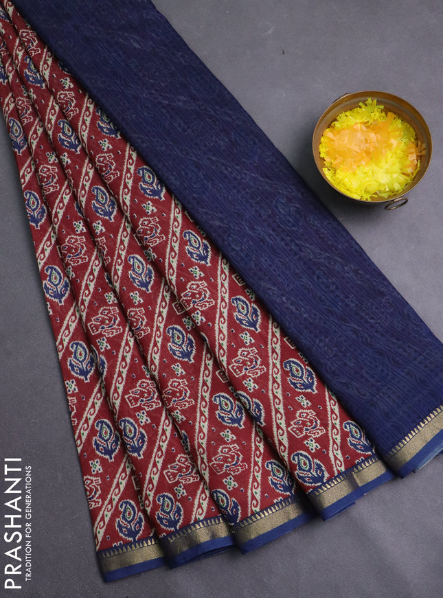 Muslin silk saree maroon and blue with allover ikat prints and zari woven border