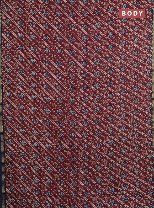 Muslin silk saree maroon and blue with allover ikat prints and zari woven border