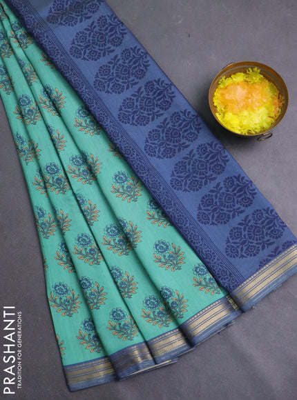 Muslin silk saree teal green and blue shade with allover floral butta prints and zari woven border